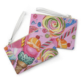 bag with front and back print view. on the font is a drawing of an ice cream cone with a cherry on top, a cup cake, lollipops, cotton candy. on the back is a donut, pop tarts bubble gum and a big lollipop