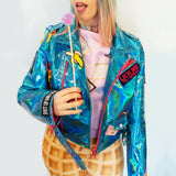 blue punk biker jacket made of iridescent shiny vinyl material with hot pink zippers rainbow chain and patches shut up and lick me lick me until I scream banana rainbow front view