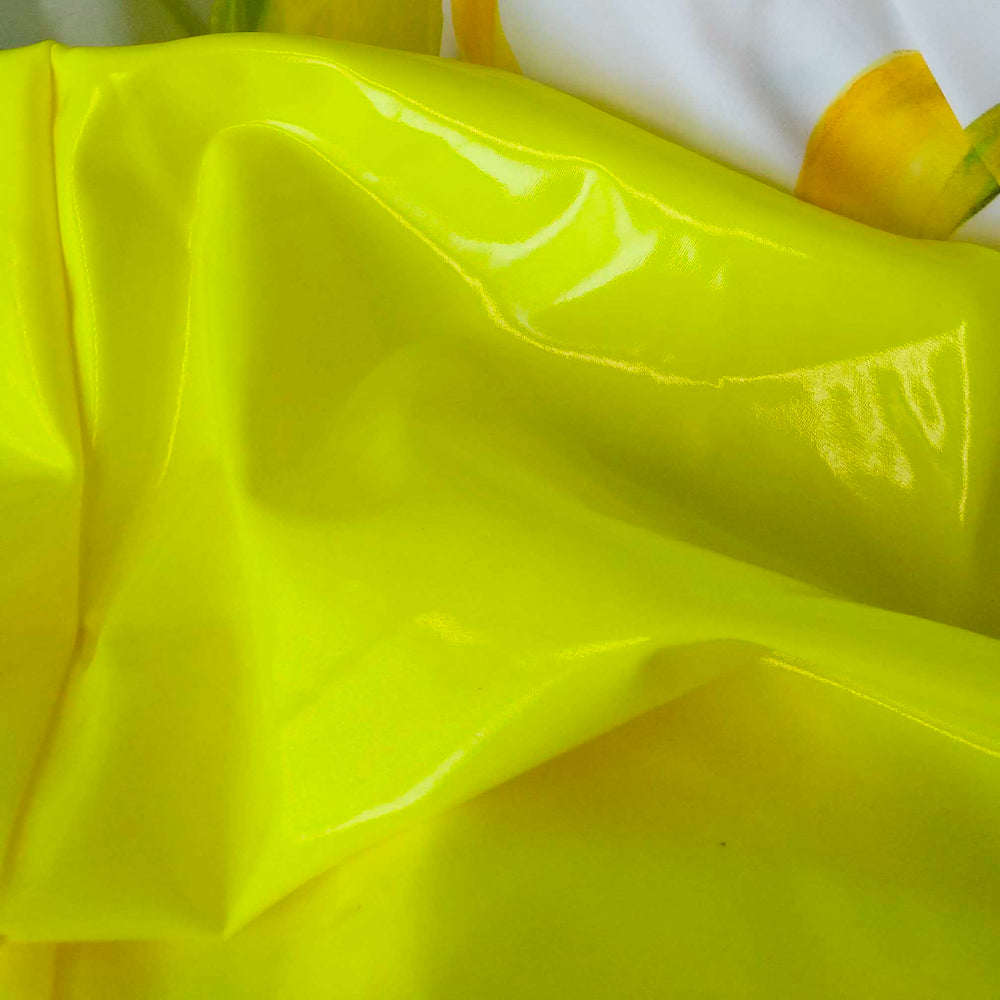 detail view of yellow latex skirt material